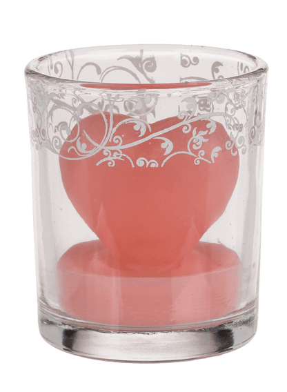 Candle in glass with decor, heart,