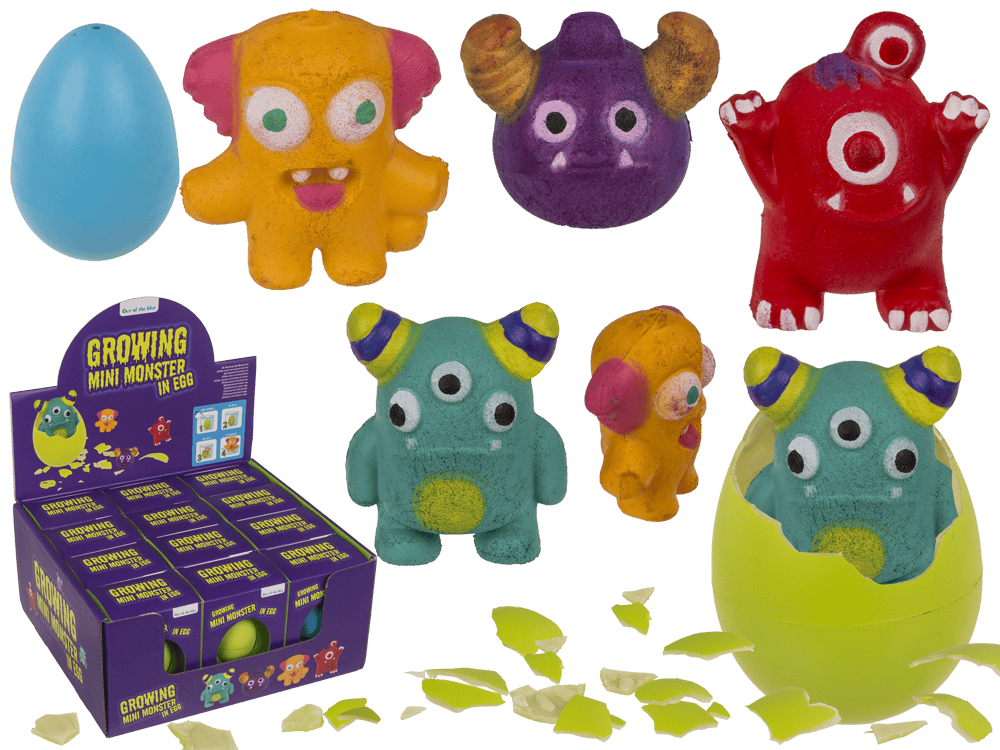11-2047_000.png Kleurige mini monsters in eieren, 6,5 cm, 4 varianten, 12 stuks per display, met schalen en eieren zichtbaar.