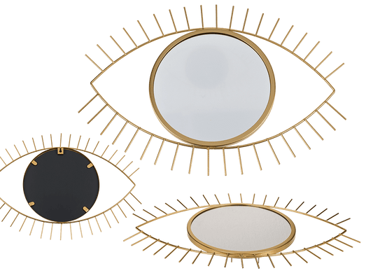 Golden colored metal mirror, eye,