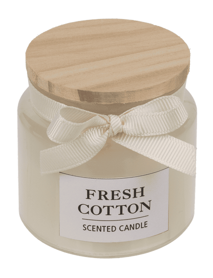 Candle in glass with wooden lid,