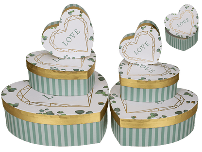 White/green colored present box in heart shape,