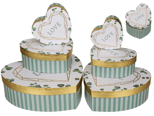 White/green colored present box in heart shape,