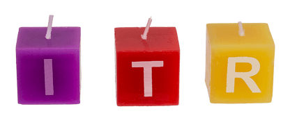 Multi coloured square candles with letters,