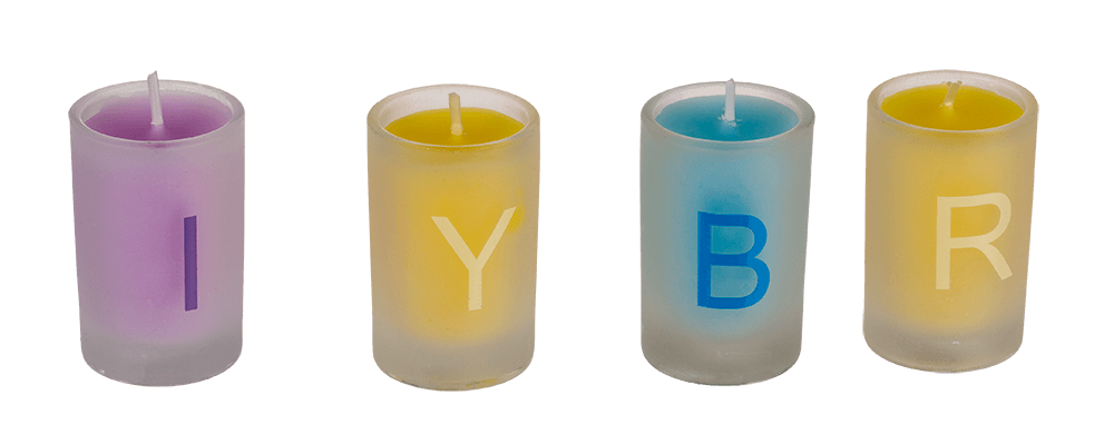 Coloured candles in glass, Happy Birthday,