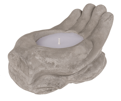Candle in cement hands