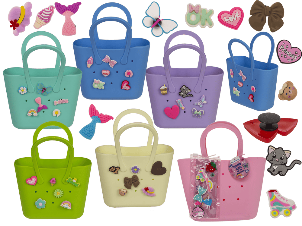 29-2615_000.png Charm handtas van silicone, 21 x 24 cm, in 6 kleuren met 6 bijgeleverde charms per tas.