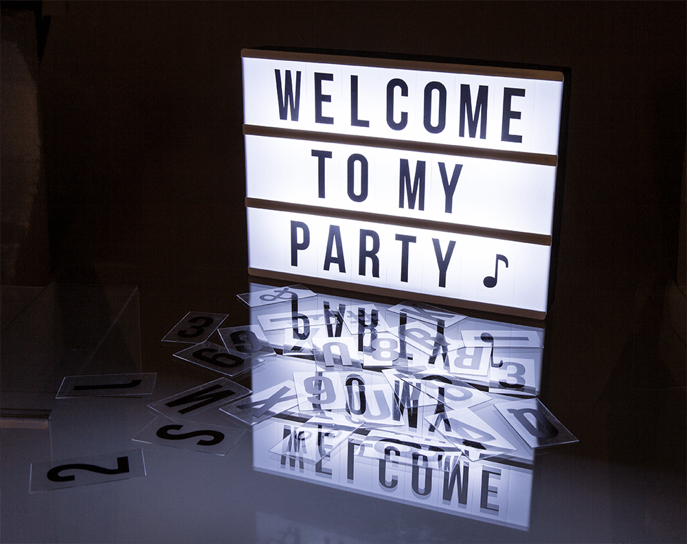 Illuminated plastic display board with 84 letters,