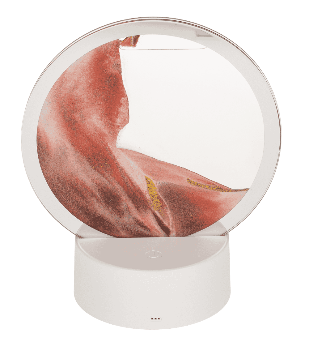 Rotating sand picture, with colour-changing LED