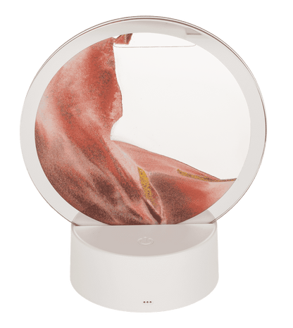 Rotating sand picture, with colour-changing LED