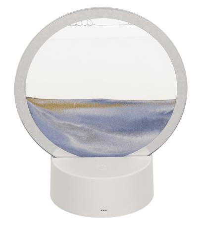 Rotating sand picture, with colour-changing LED