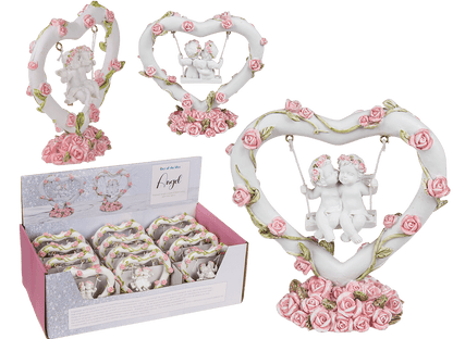 Polyresin angel couple in heart swing with pink,