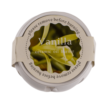 White ceramic aroma lamp with scented melts,