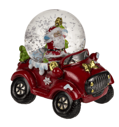 Polyresin snow globe with Christmas figurines on,