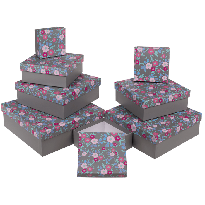 Caja de regalo gris, flores de primavera,