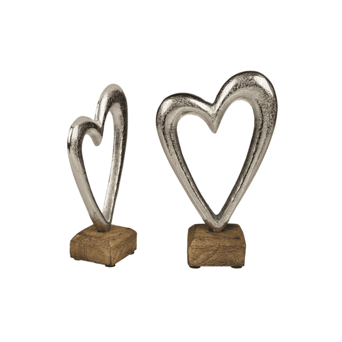 Metal heart on wooden base,