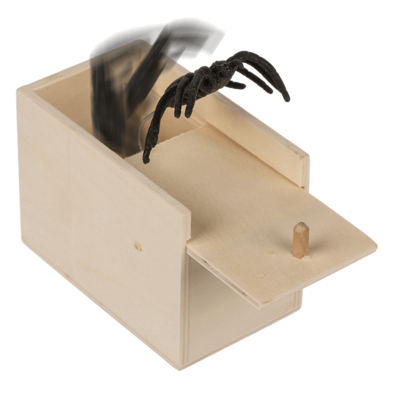 Araña escalofriante en caja de madera,