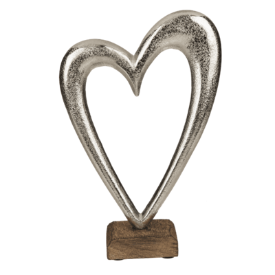 Coeur en métal sur socle en bois,