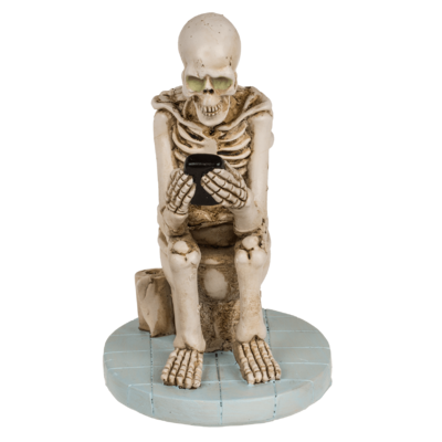 Esqueleto sobre inodoro, aprox. 13 x 10 cm