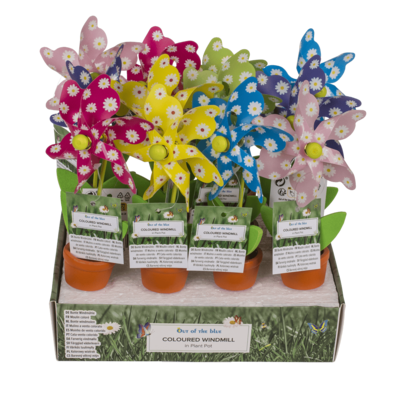 Moulin à vent multicolore dans un pot à plantes