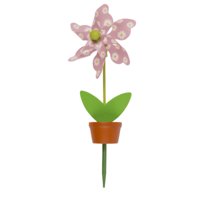 Moulin à vent multicolore dans un pot à plantes