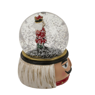 Polyresin snow globe with nutcracker,