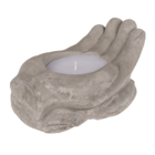 Candle in cement hands