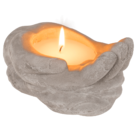 Candle in cement hands