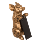 Golden colored decoration figuren, pig with