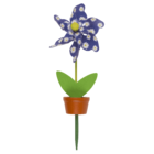 Moulin à vent multicolore dans un pot à plantes
