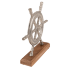 Silver colored metal wheel, on wooden base,